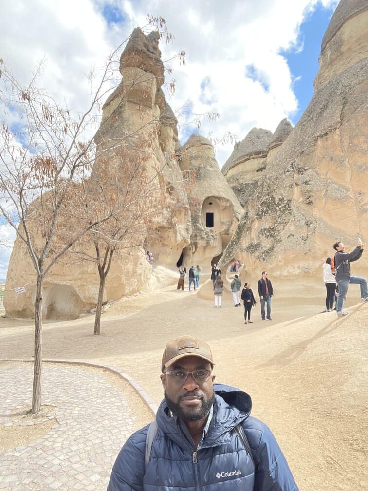 image showing Enoch Omololu posing for a photo in cappadocia, turkey